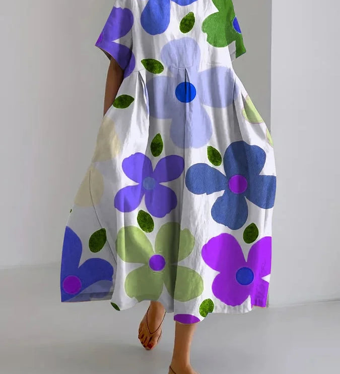 Elisenda™ | Kukkakuvioinen väljä mekko