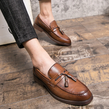 Nahkaiset loaferit, joissa tupsut